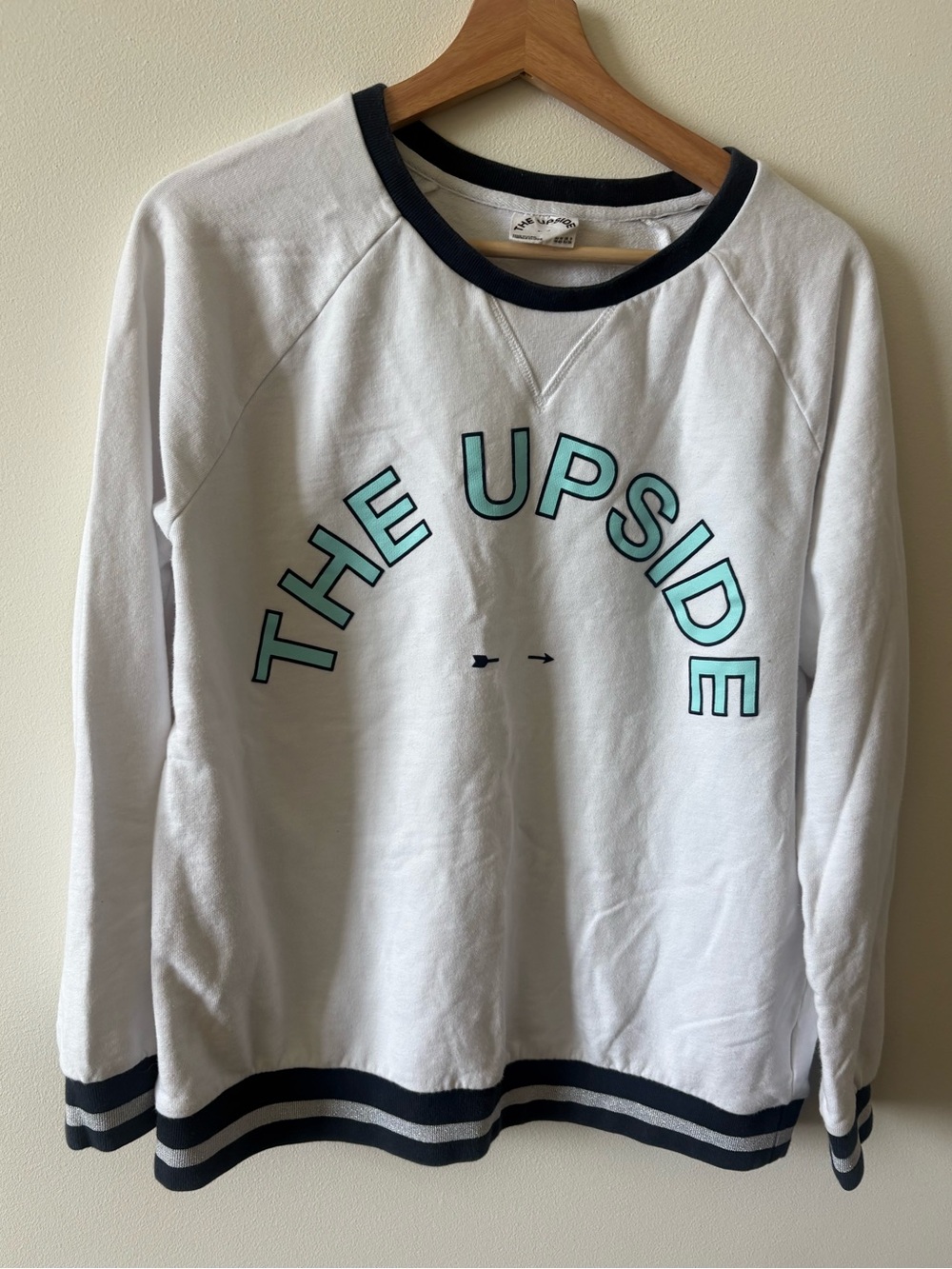 The Upside White Sweatshirt with blue and silver Trim